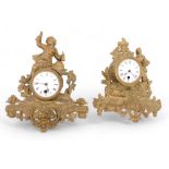 Two late 19th/early 20thC French gilt metal figural mantel clocks, each with a white enamel dial, bo