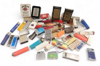 A collection of lighters, to include Zippo, Marlborough advertising, Stones, and others. (1 tray)