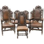 A set of eight Victorian carved oak dining chairs, each back carved with a mask, leaves, spirally tu