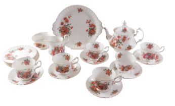 A Royal Albert centennial rose pattern part tea service, to include teapot and cake plate.