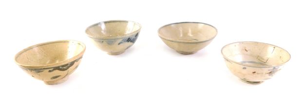 Four Chinese pottery blue and white bowls, each decorated in underglaze blue, the largest 13cm diame