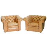 A brown leather three seat Chesterfield sofa, and two matching arm chairs, the sofa 212cm wide. (AF)