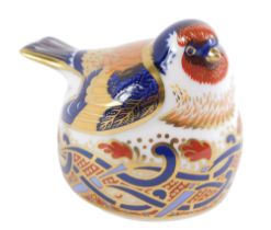 A Royal Crown Derby Goldfinch Nesting paperweight, dated 1996, with silver stopper, 7cm high.