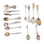 A collection of various silver and white metal souvenir spoons, and others, 4.75oz all in.