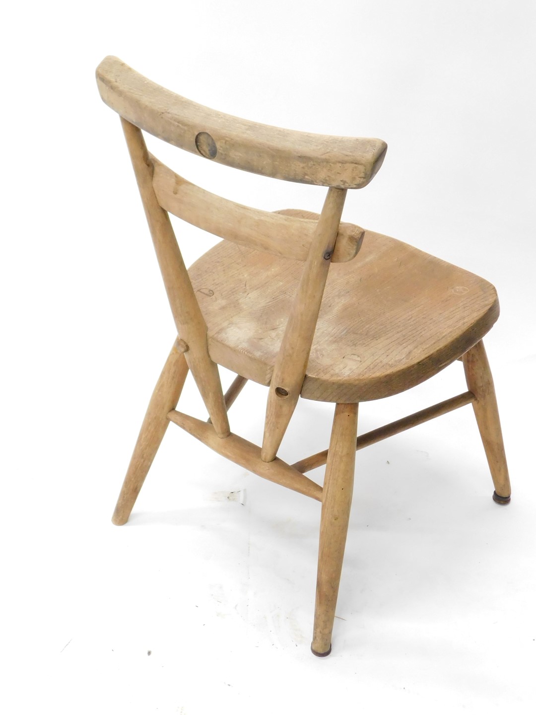A mid 20thC ash and elm Ercol child's chair, with a tapering back, solid seat, on turned legs, lacki - Image 2 of 2