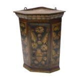 A 19thC Continental pine corner cupboard, bearing date ANO 1808, and painted with flowers, leaves, e