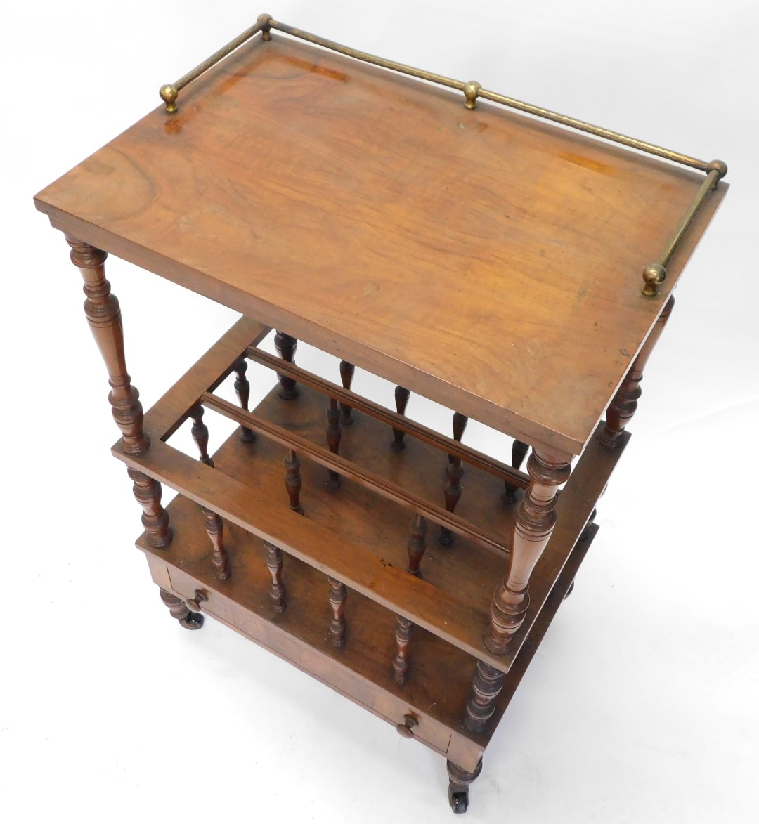 A Victorian walnut Canterbury whatnot, the rectangular top with three quarter brass gallery, on turn - Image 2 of 2
