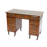 A Victorian ash and mahogany pedestal desk, the rectangular top inset with green leatherette, above