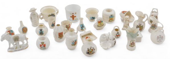 A quantity of crested china, to include novelty figures of a Peterborough dog, Isle of Wight match s