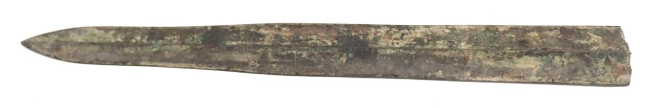 A Persian style sword blade, unmarked, 41cm long.