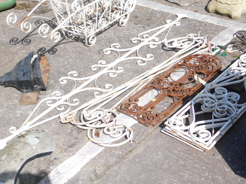 Two cast iron drain hoppers, together with unassembled garden trellis, etc.