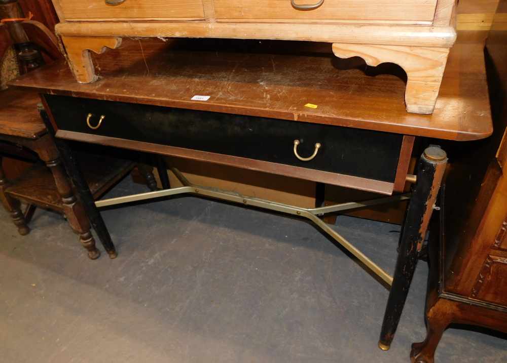 An ebonised G-Plan side table with teak top and single drawer.