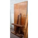 A mahogany refectory table, with two plank top, on trestle support ends,