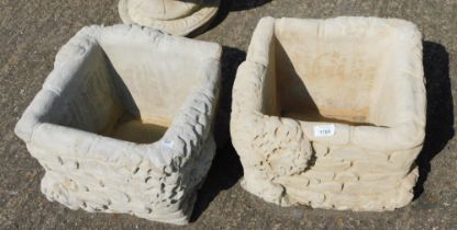 A pair of large reconstituted stone ivy and brick planters, each festooned with ivy, square design,