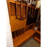 A 1960s teak effect display cabinet. WARNING! This lot contains untested or unsafe electrical items