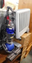 A Dyson Ball DC24 vacuum cleaner and a Dimplex heater. (2)