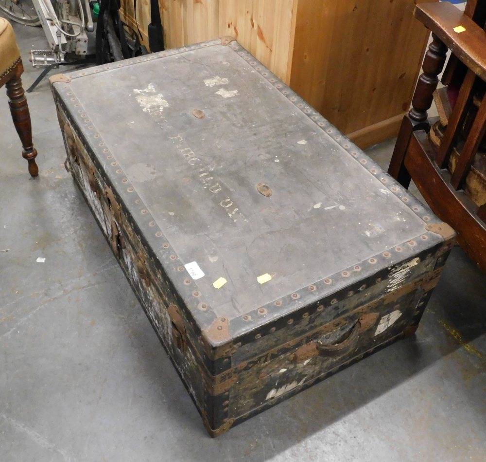 A military canvas bound trunk.