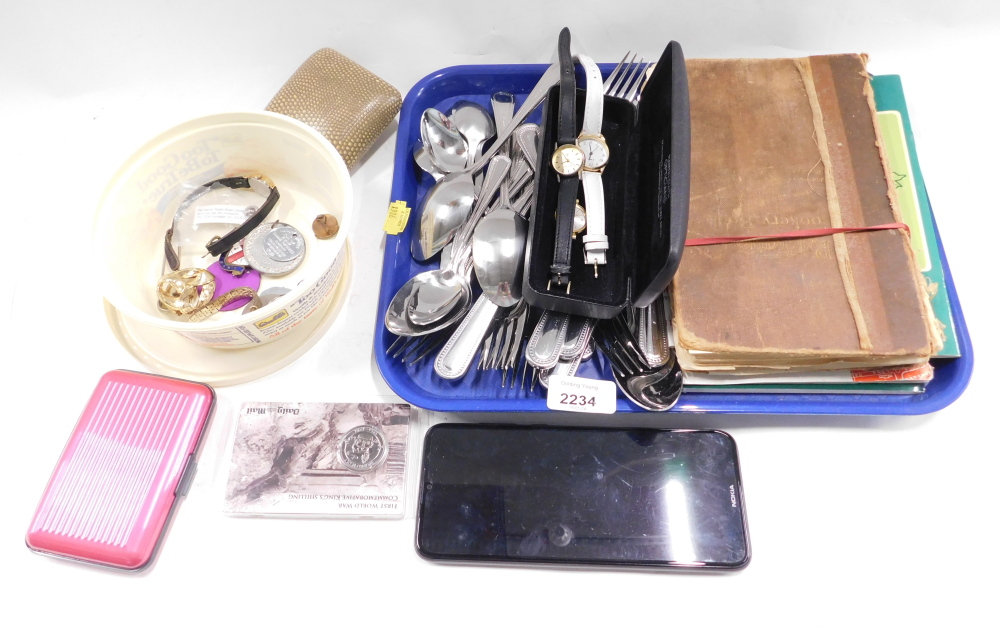 Various Oneida flatware, together with a copy of the Radiation Cookery Book, wristwatches, a Nokia m