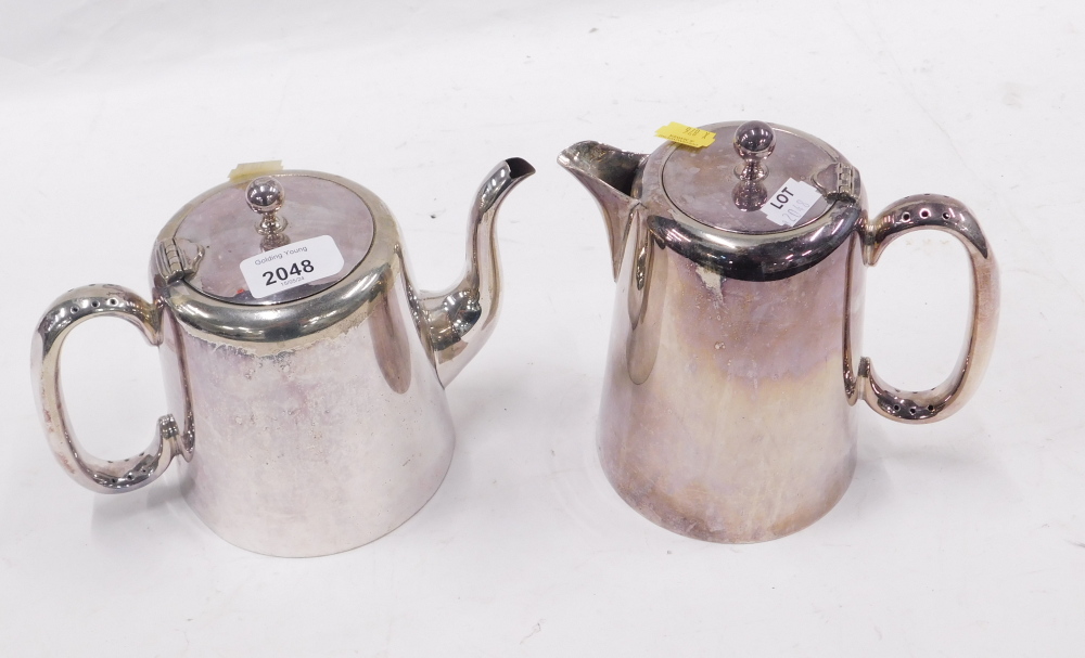 A plated teapot, together with a hot water jug.