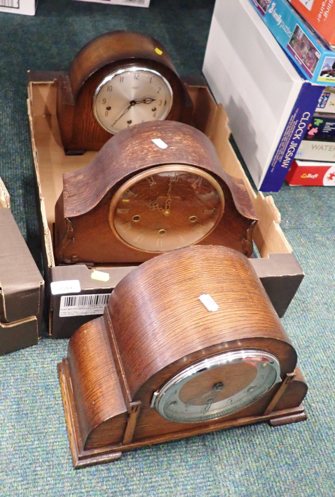 Three oak cased mantel clocks.