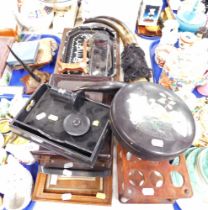 A 1930s Bakelite case, containing hairdryer, ebony desk stand, Eastern mother of pearl inlaid tray,