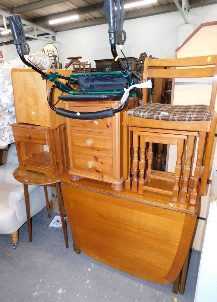 A drop leaf kitchen table, side chair, three drawer pine bedside, mobility walker, nest of tables, s