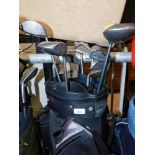 A Powakaddy soft shell golf club bag, and various clubs to include Ping, Dynacraft and others. Buye