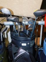 A Powakaddy soft shell golf club bag, and various clubs to include Ping, Dynacraft and others. Buye
