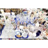 Glassware, to include dressing table tray, various drinking glasses, vases, meerkat figures, two pin