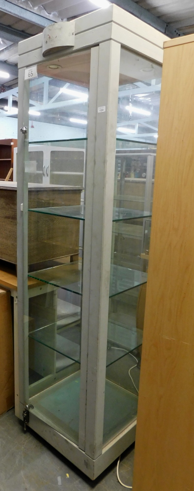 A museum type display cabinet, tall pillar design, with three shelves, 220cm high, 60.5cm wide, 60.5