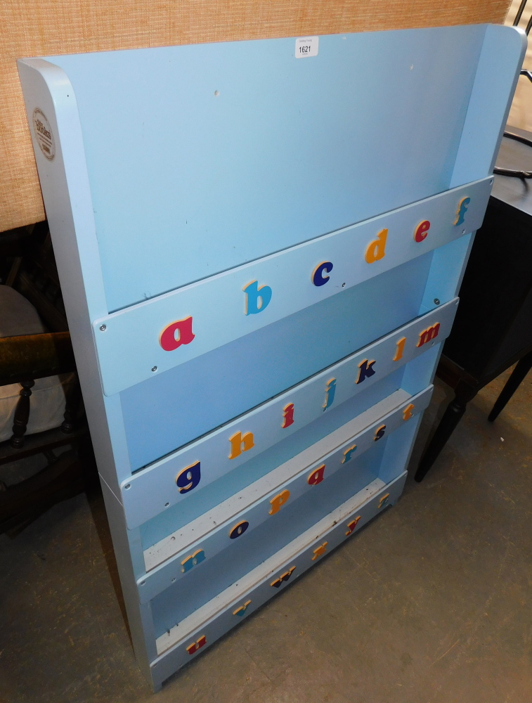 A pale blue painted pine wall rack, with alphabet front.