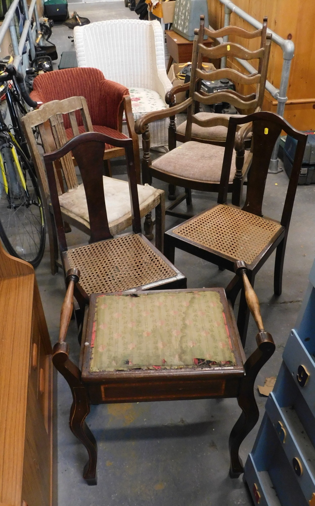 Assorted chairs, comprising a Lloyd Loom style high backed armchair, various dining chairs, and Edwa