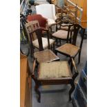 Assorted chairs, comprising a Lloyd Loom style high backed armchair, various dining chairs, and Edwa