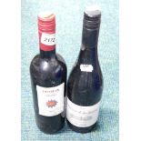 A bottle of Puglia Rosso 2016 red wine and a bottle of Reserve de la Saurinen 2015 wine (2).