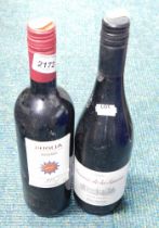 A bottle of Puglia Rosso 2016 red wine and a bottle of Reserve de la Saurinen 2015 wine (2).