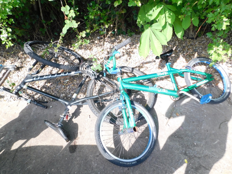 An Urban Gorilla tail whip child's bicycle, in metallic green trim, together with a Carrera bicycle