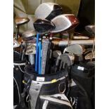 A TaylorMade soft shell golf caddy and various clubs, to include Wilson and Dunlop. Buyer Note: VAT