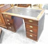 A mid 20thC mahogany pedestal desk, with leather inset top, on two legs, each set with three drawers