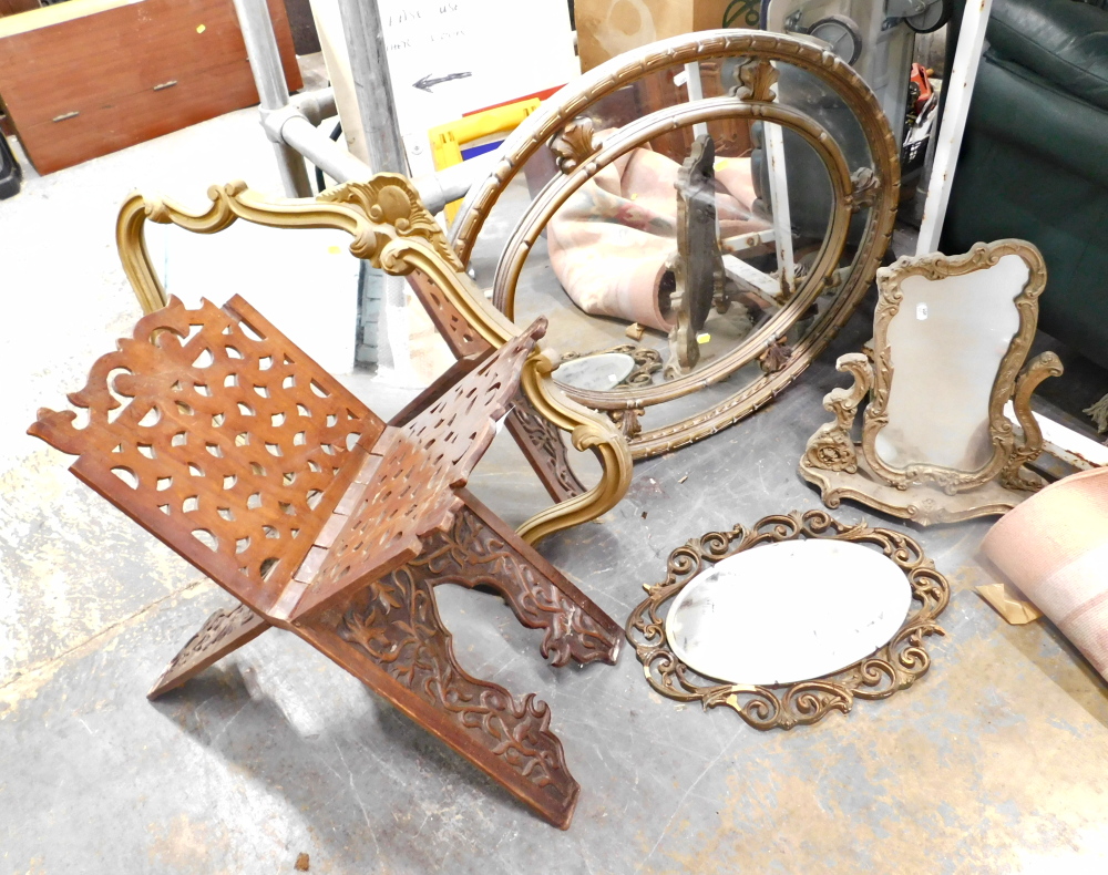 Four gilt framed wall mirrors, dressing table mirror and an Eastern inspired stand.