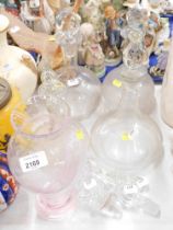 Various decanters and stoppers, together with loose decanters, and a Caithness baluster shaped vase,