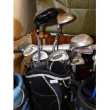 A Taifan soft shell golf carry bag and various Stealth and Petron clubs. Buyer Note: VAT payable on