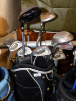 A Taifan soft shell golf carry bag and various Stealth and Petron clubs. Buyer Note: VAT payable on