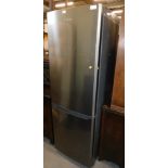 A Samsung fridge freezer, 183cm high, 59cm wide, 62cm deep.