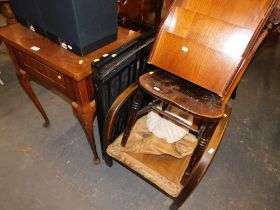 A walnut sewing table, magazine rack, side chair, easy chair, and a fire guard. (5)