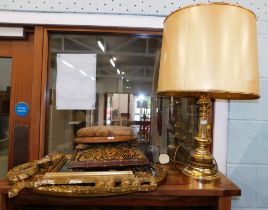 Two gilt framed wall mirrors, two 19thC footstools, and a brass table lamp with decorated shade sign