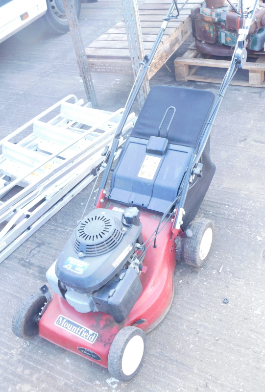 A Mountfield petrol lawn mower, with Honda 4.5 engine. Buyer Note: VAT payable on the hammer price