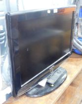 A Samsung 26" flat screen television, with remote.