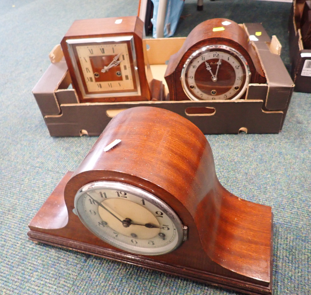 Three oak cased mantel clocks.