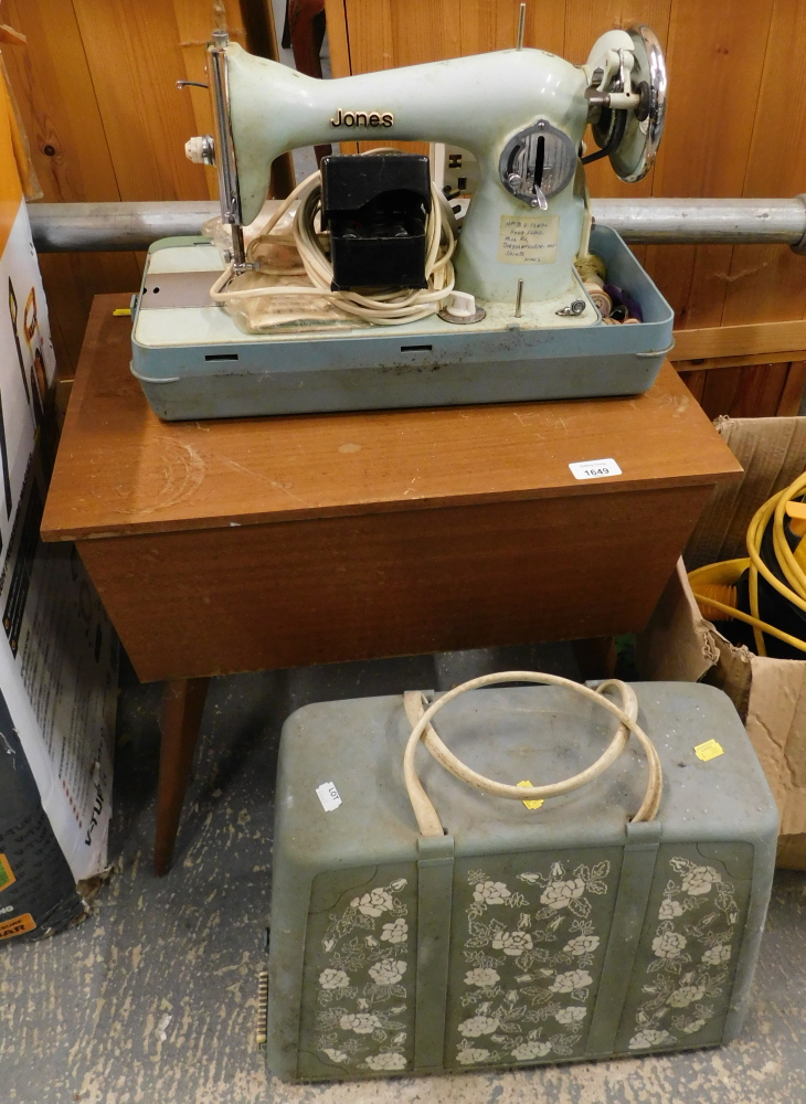 A teak sewing machine table and a cased blue Jones sewing machine.