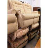 A cream material finish sofa suite, comprising two armchairs, one reclining, two seater sofa, and an